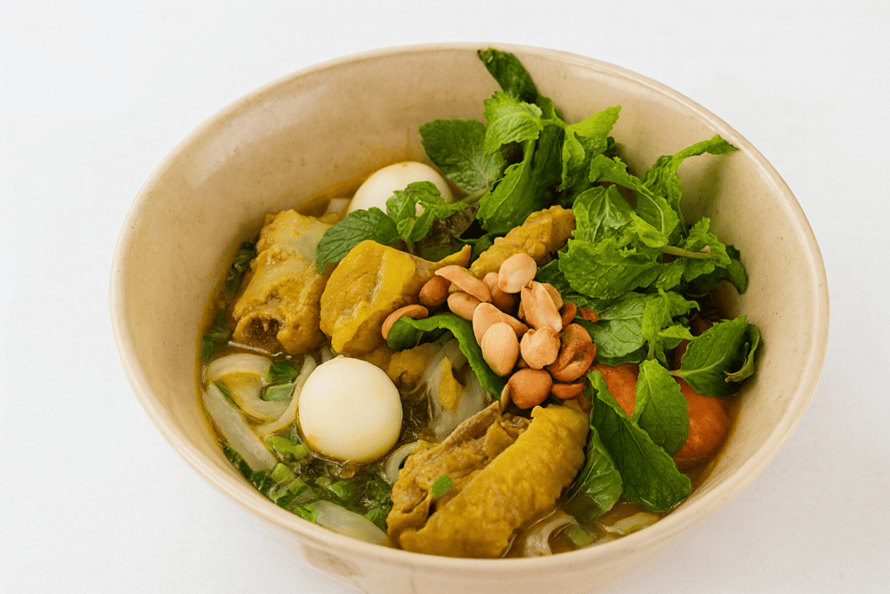 The chicken Mi Quang includes carefully cleaned chicken offal cooked together with the meat